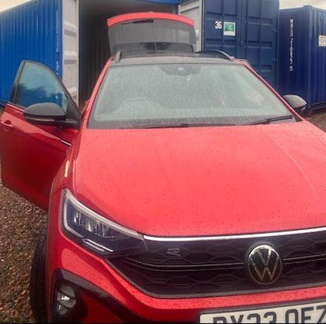 car next to a storage locker