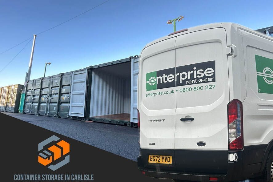 A transit van beside a row of green self storage shipping containers