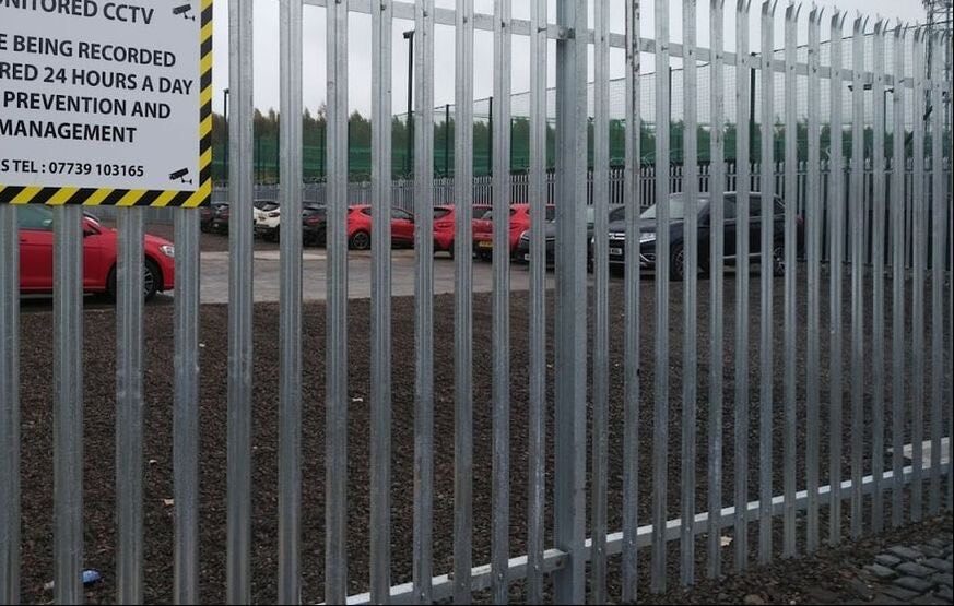 cars parked inside a secure storage yard compound in Carlisle