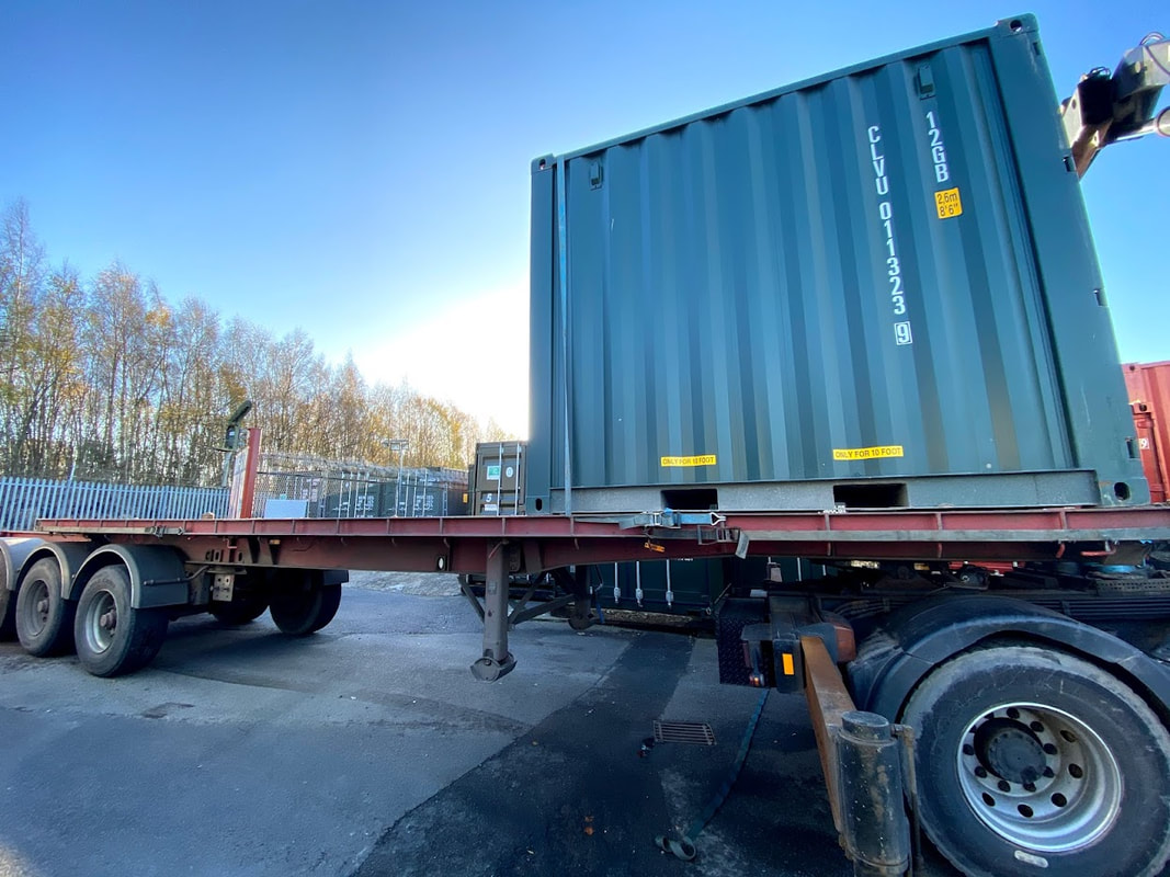 10 foot ISO shipping container on an HGV