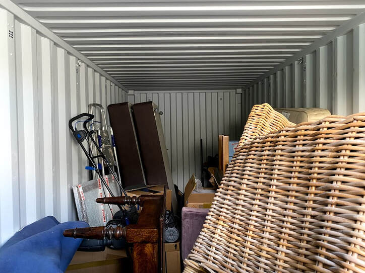 a storage unit full of furniture