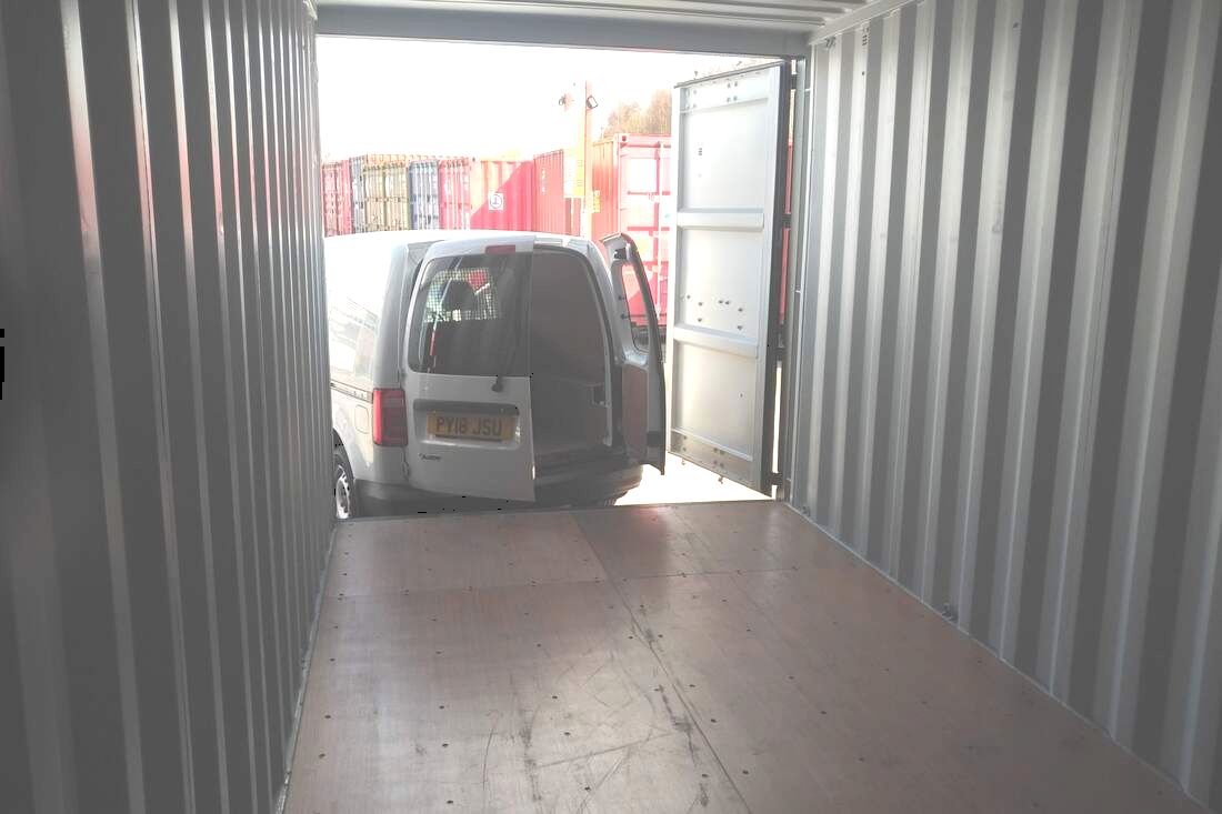 unloading into a shipping storage container